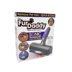 NC Furdaddy Sonic Pet Hair Remover roller on a couch collecting fur
