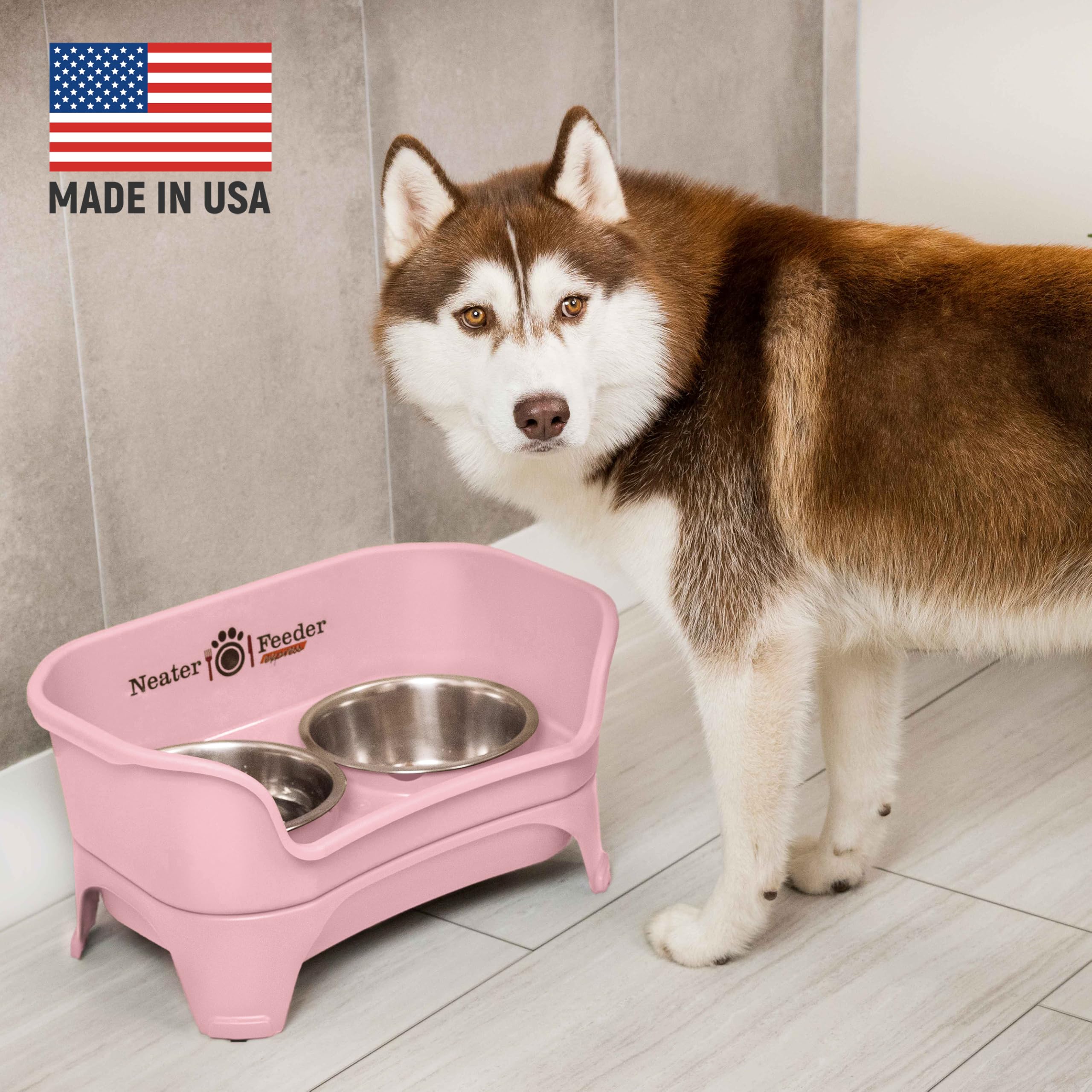 Neater Feeder Express pink top-compartment view illustrating spill containment during meals
