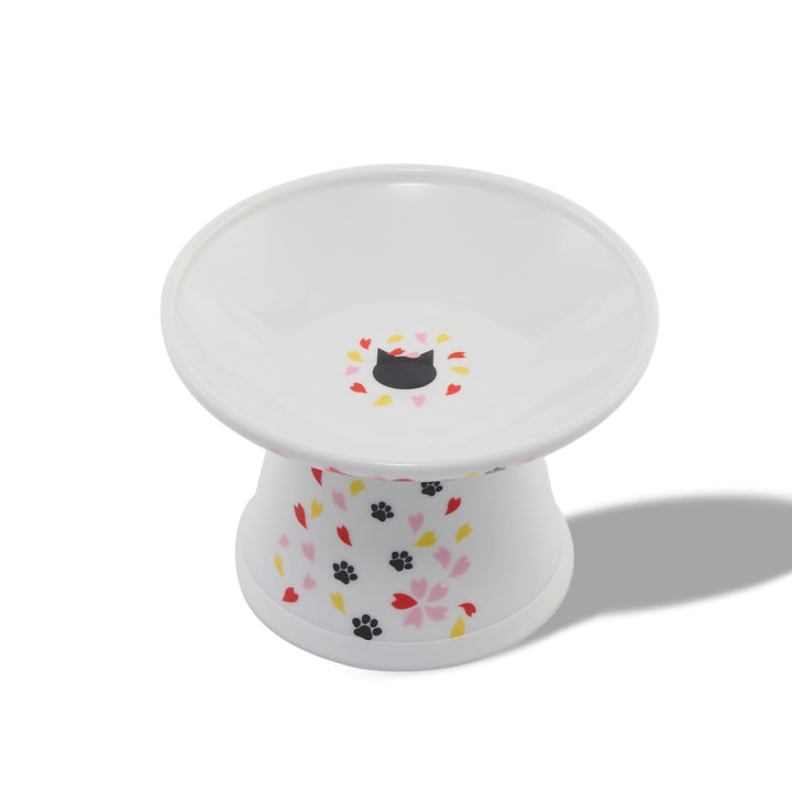 Necoichi raised bowl with sakura floral front supports whisker comfort during meals