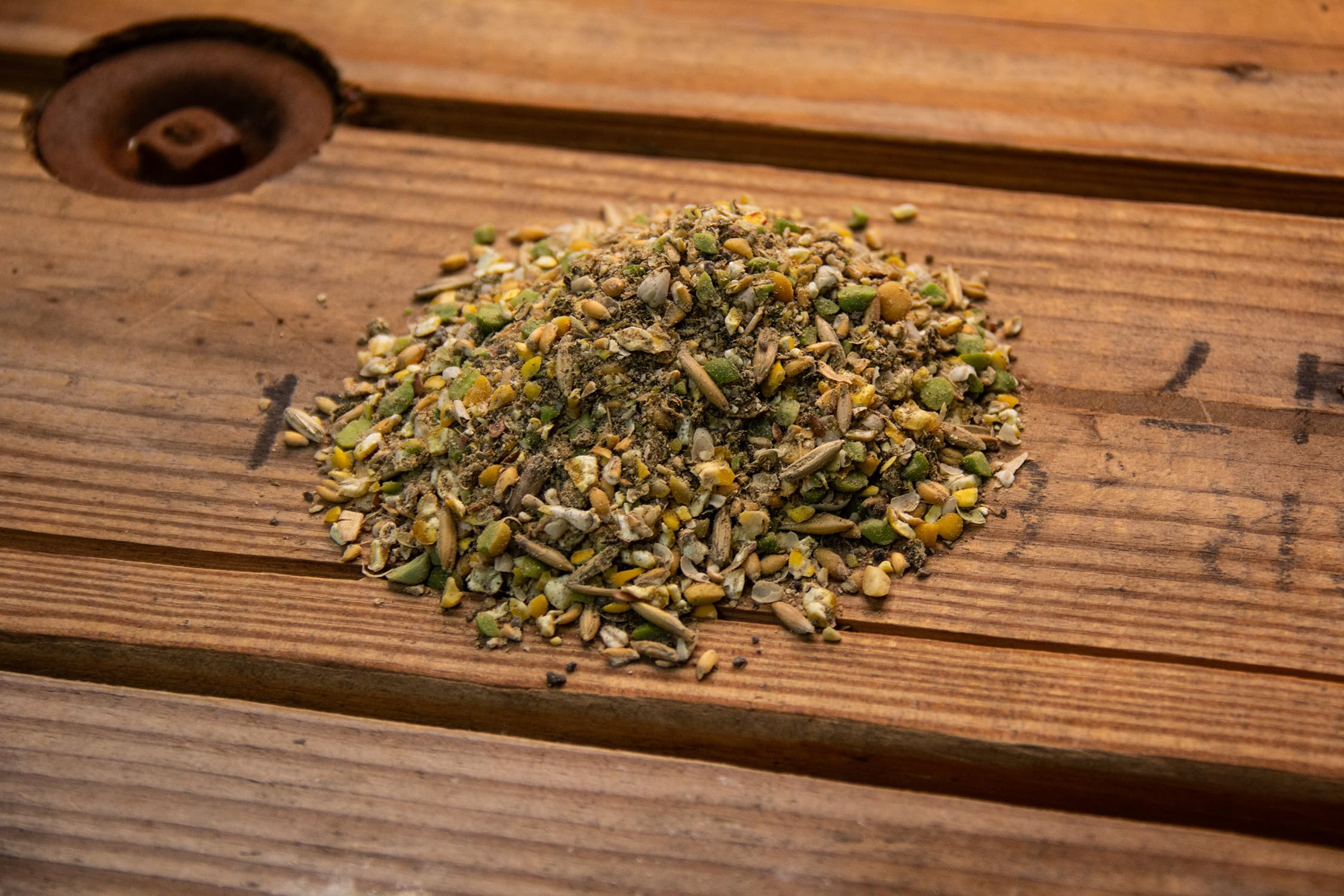 New Country Organics Classic Layer Feed hens eating demonstrates nutritious pellets for steady energy.