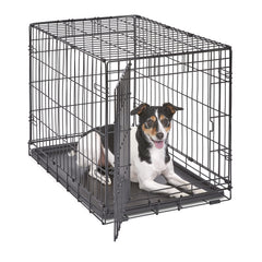 New World crate with door closed, secure for travel and home use.