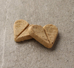 Newman's Own organic barley flour biscuit highlighting simple ingredients
