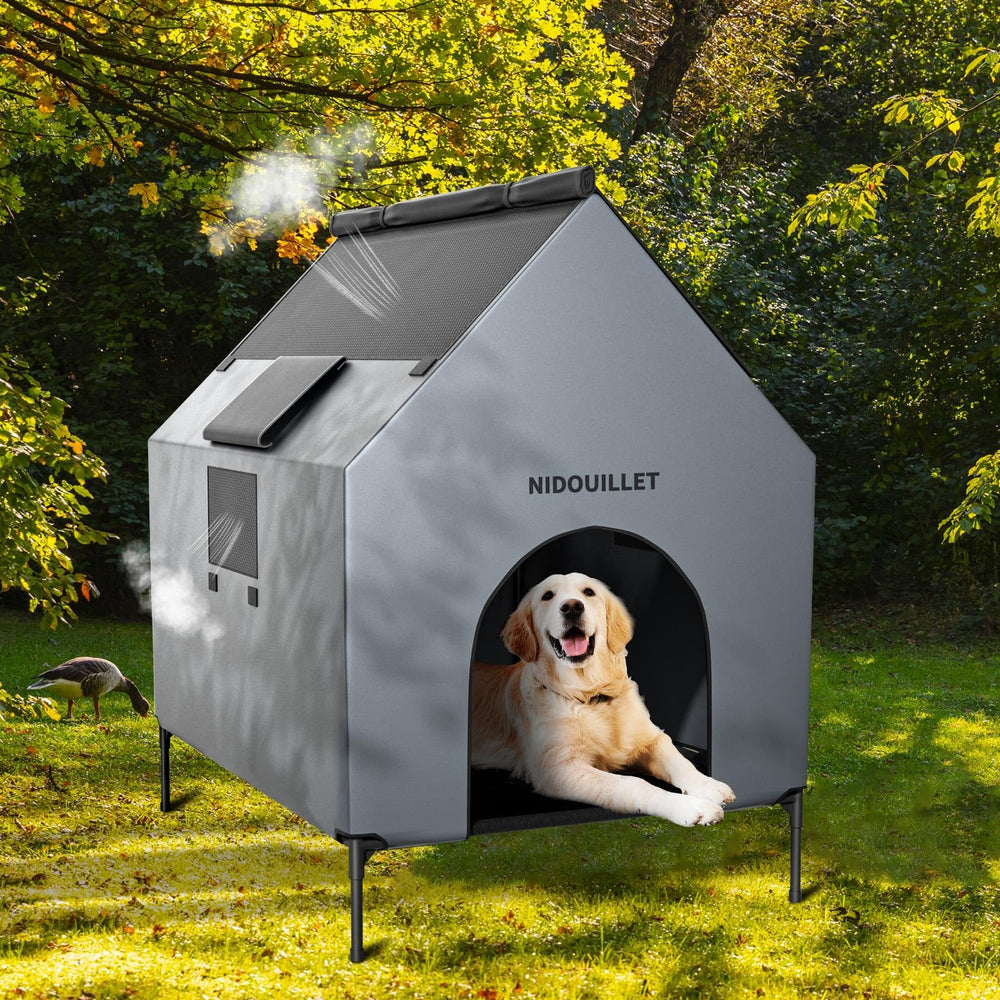 Nidouillet 600D PVC cover shields dog from wind, rain, and snow.