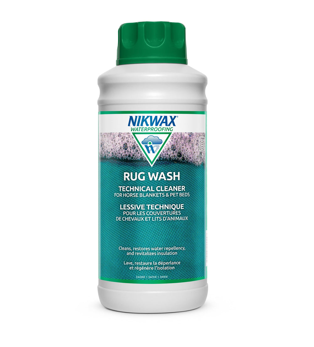 Nikwax Rug Wash 1L bottle front view for revitalizing blankets and pet beds.