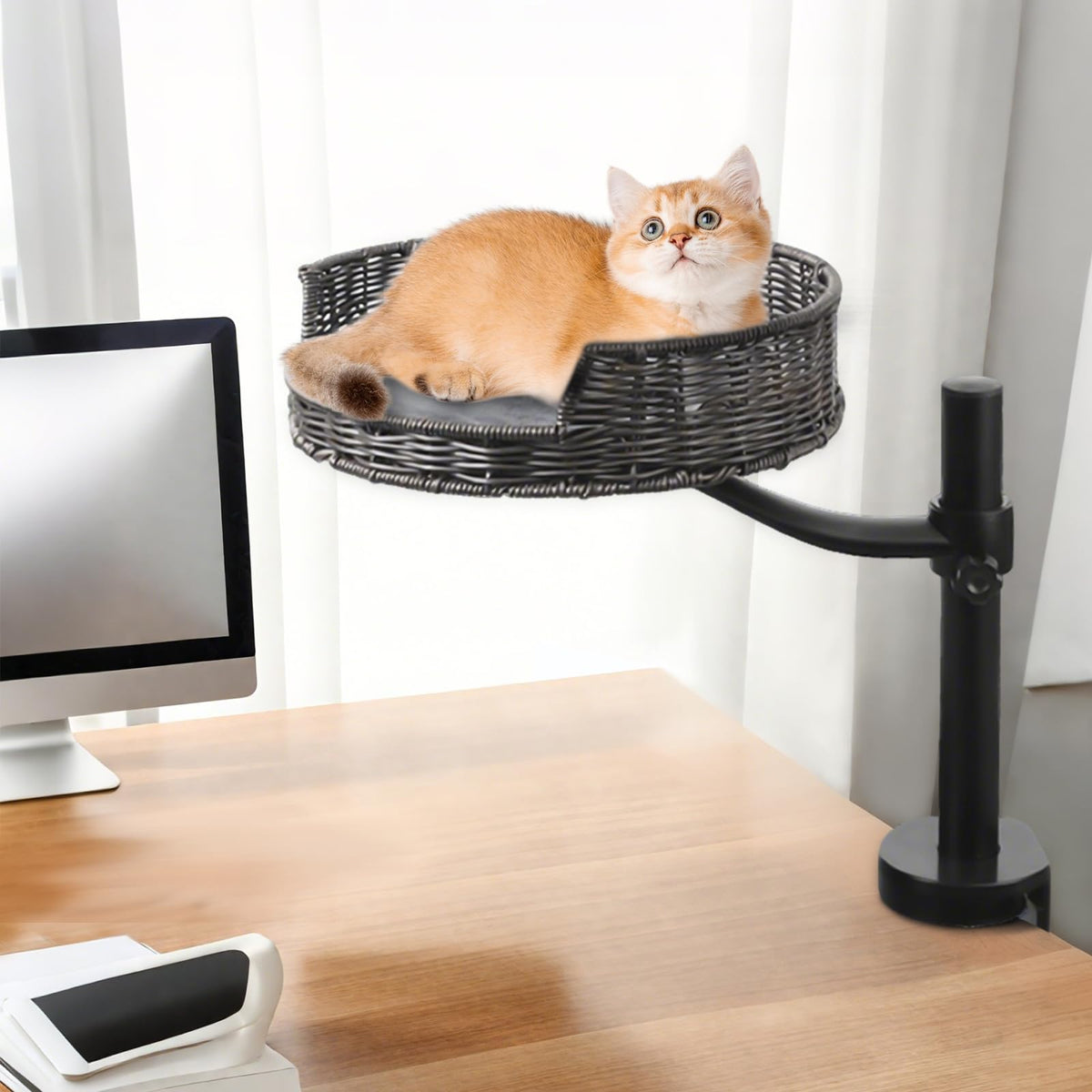 Niubya cat desk bed base on a desk saves space while keeping your cat close.