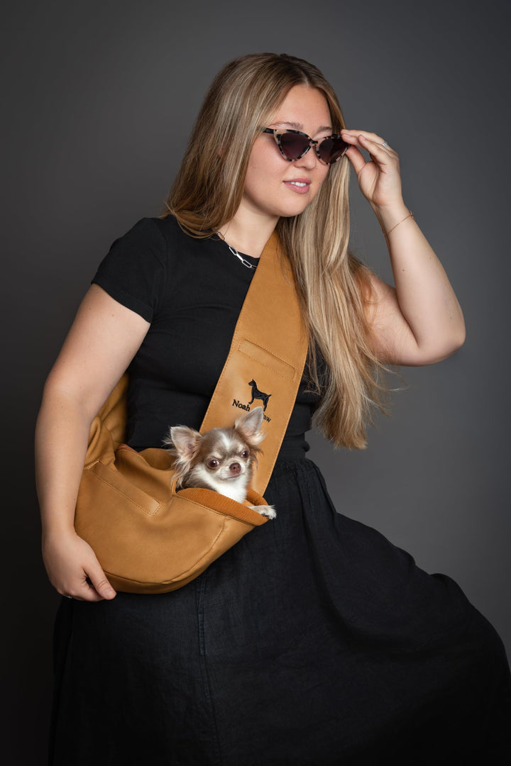 Noah & Paw adjustable-strap close-up shows comfortable, customizable carry.