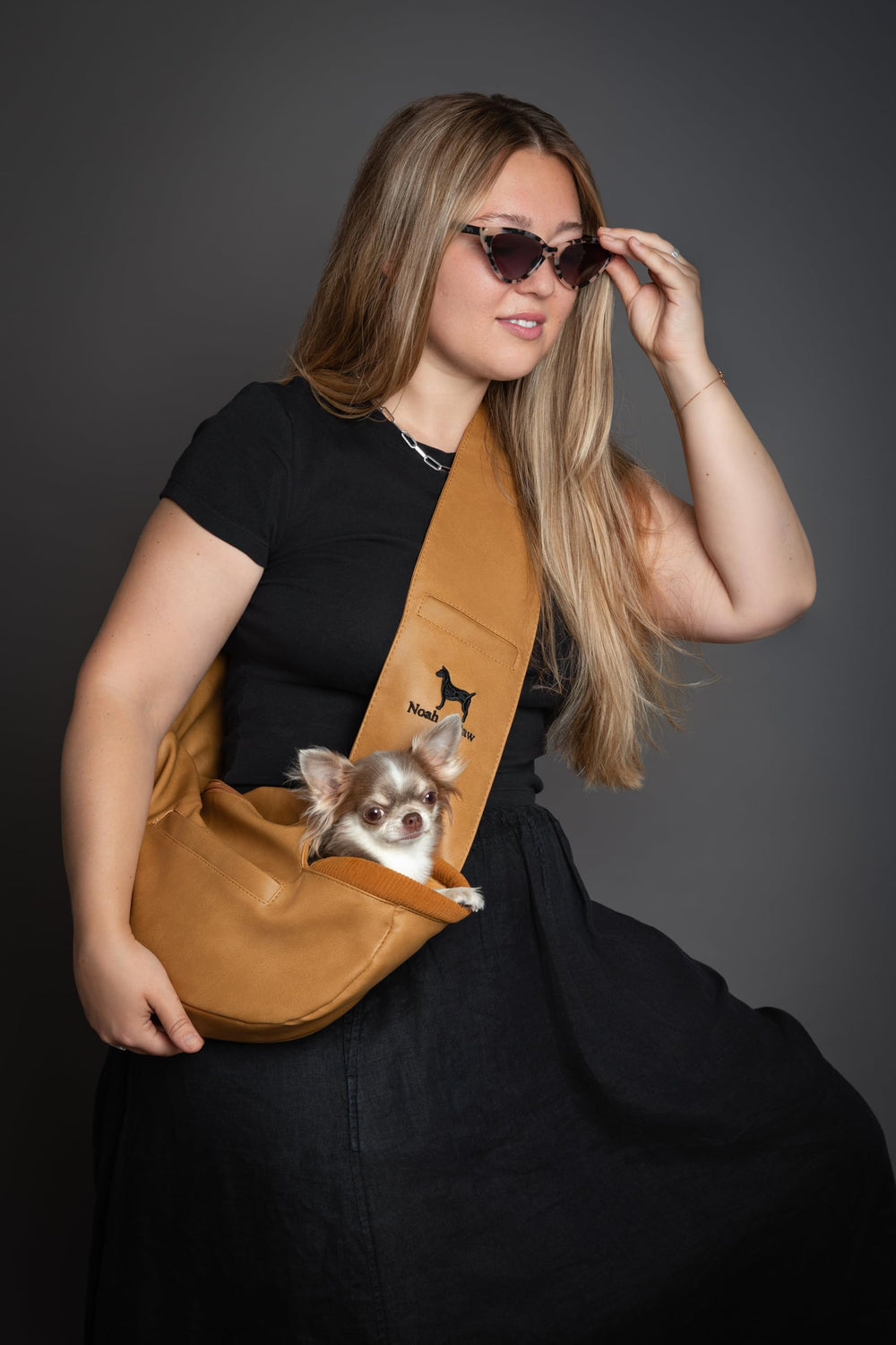 Noah & Paw adjustable-strap close-up shows comfortable, customizable carry.