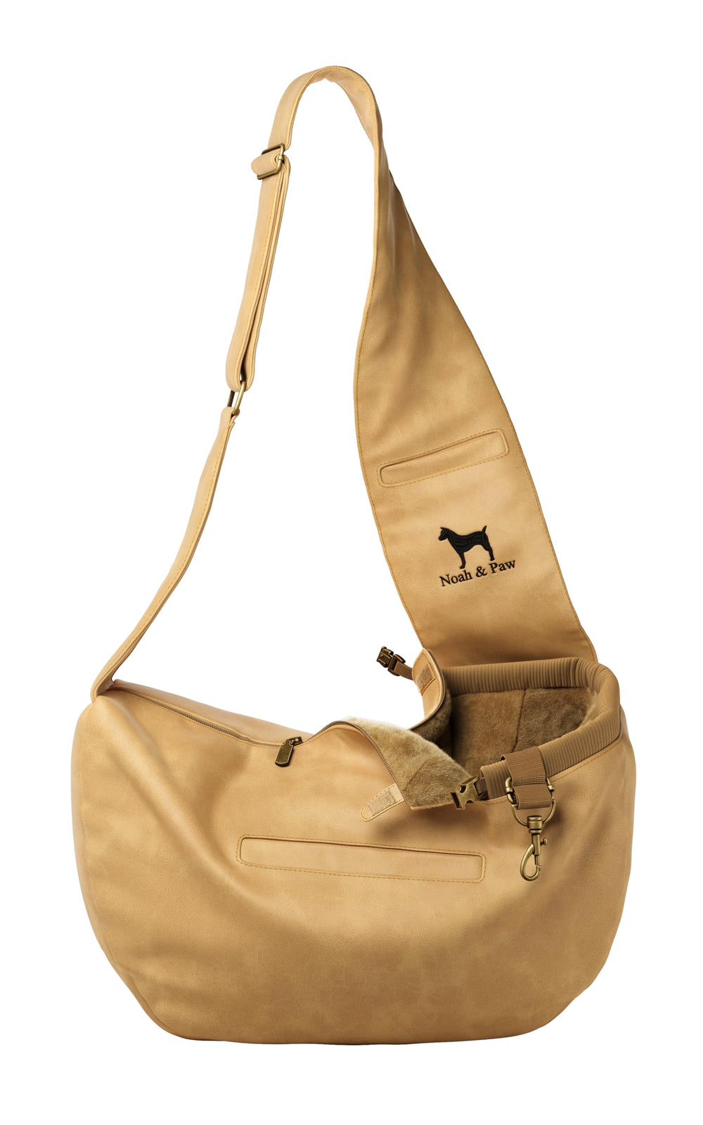 NOAH & PAW dog sling on the shoulder for easy, hands-free small dog carrying.