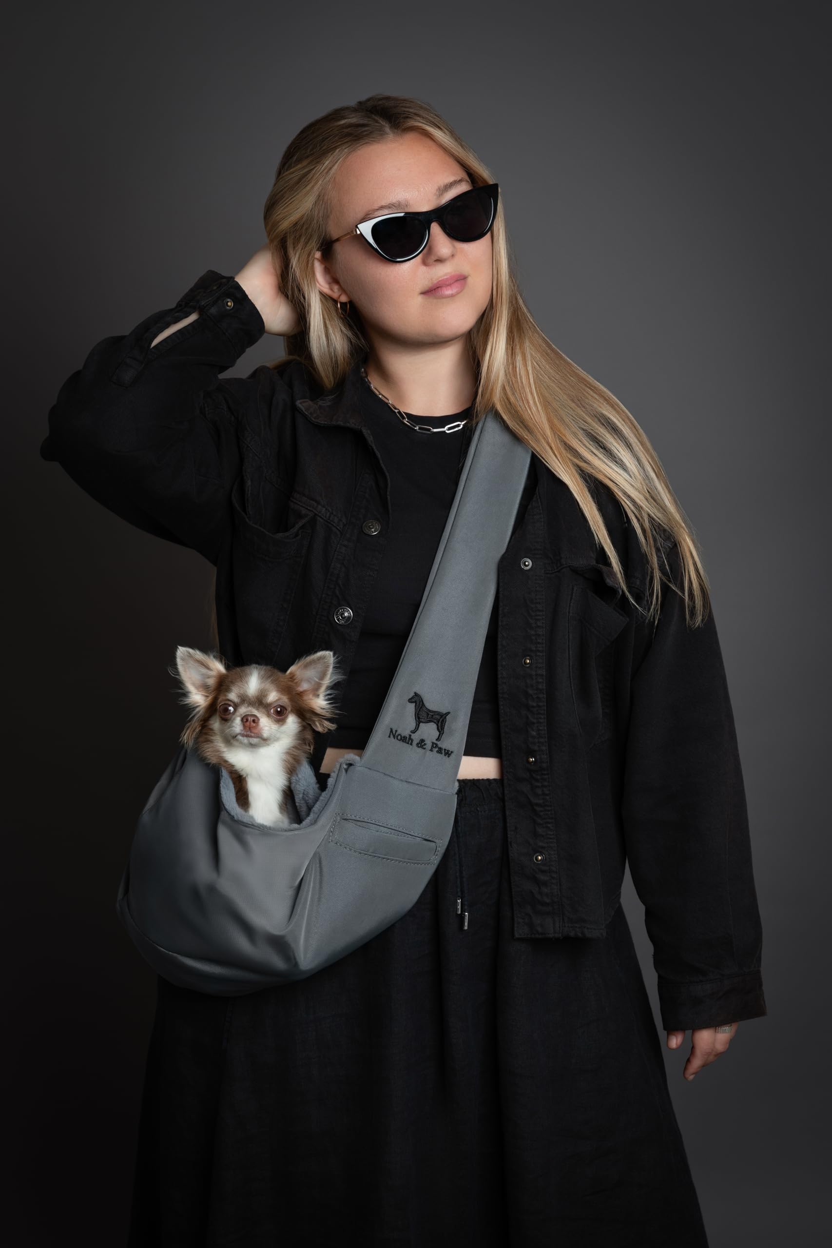 Lightweight Noah & Paw sling suitable for travel and city outings.