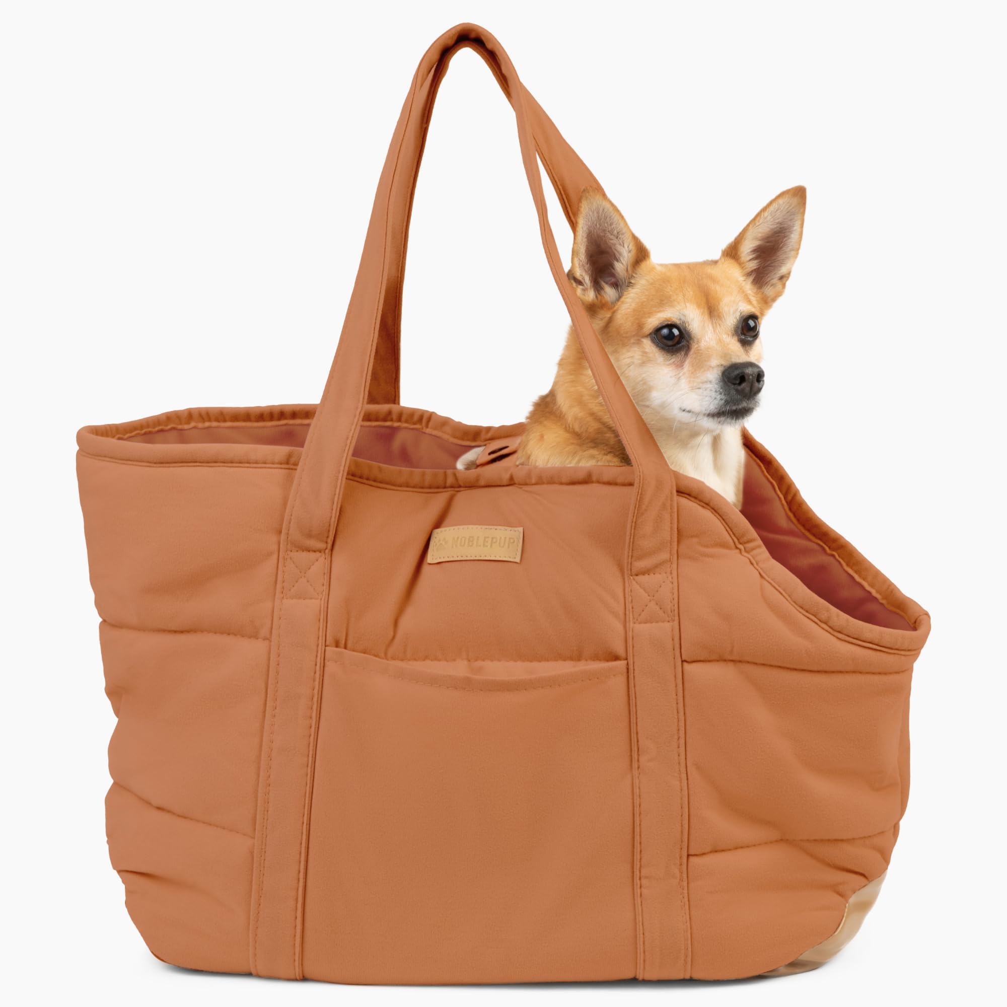 NoblePup plush dog purse carrier in brown for secure travel with small dogs.