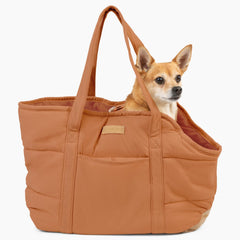 NoblePup plush dog purse carrier in brown for secure travel with small dogs.