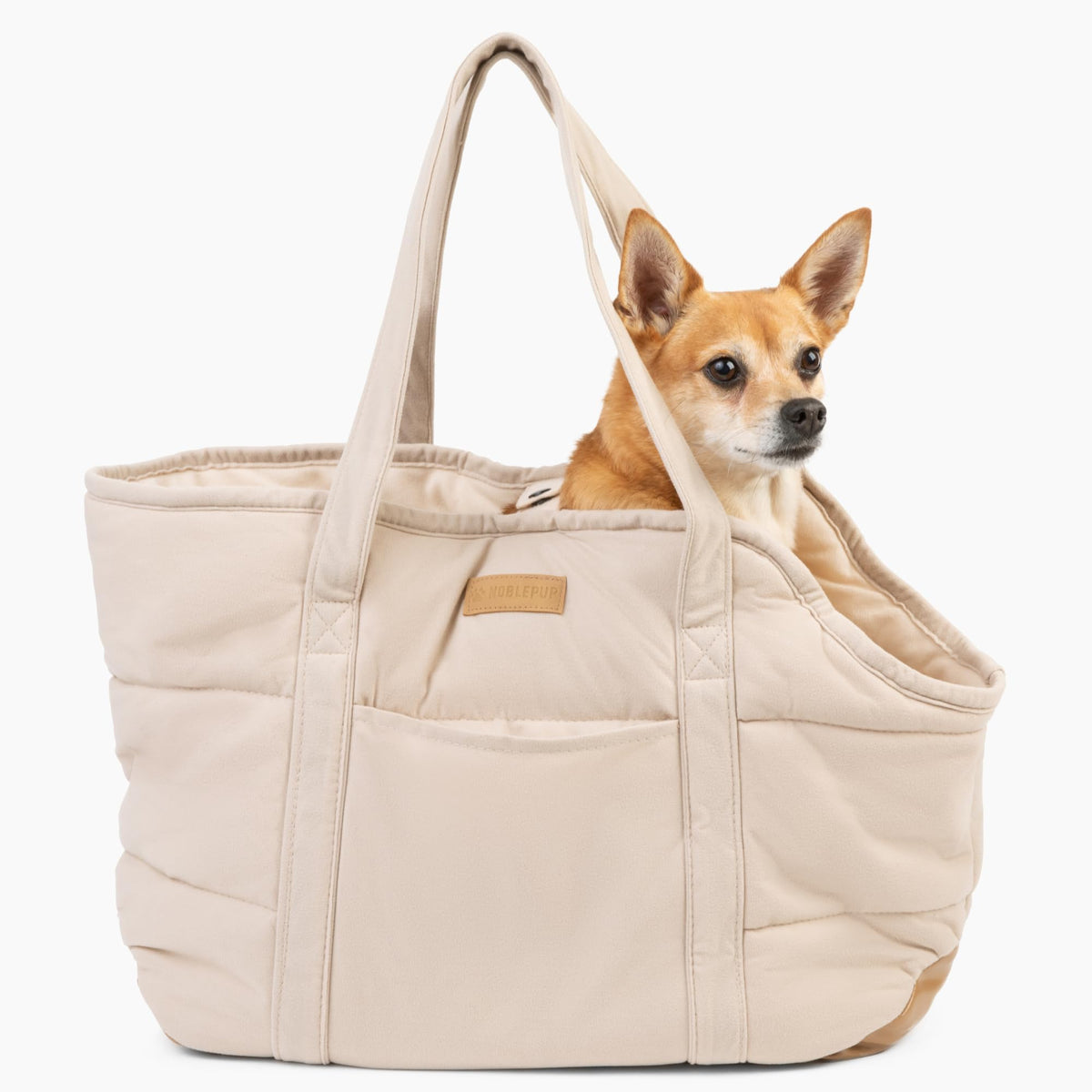NoblePup plush purse exterior shows soft fabric and inviting silhouette for small dogs
