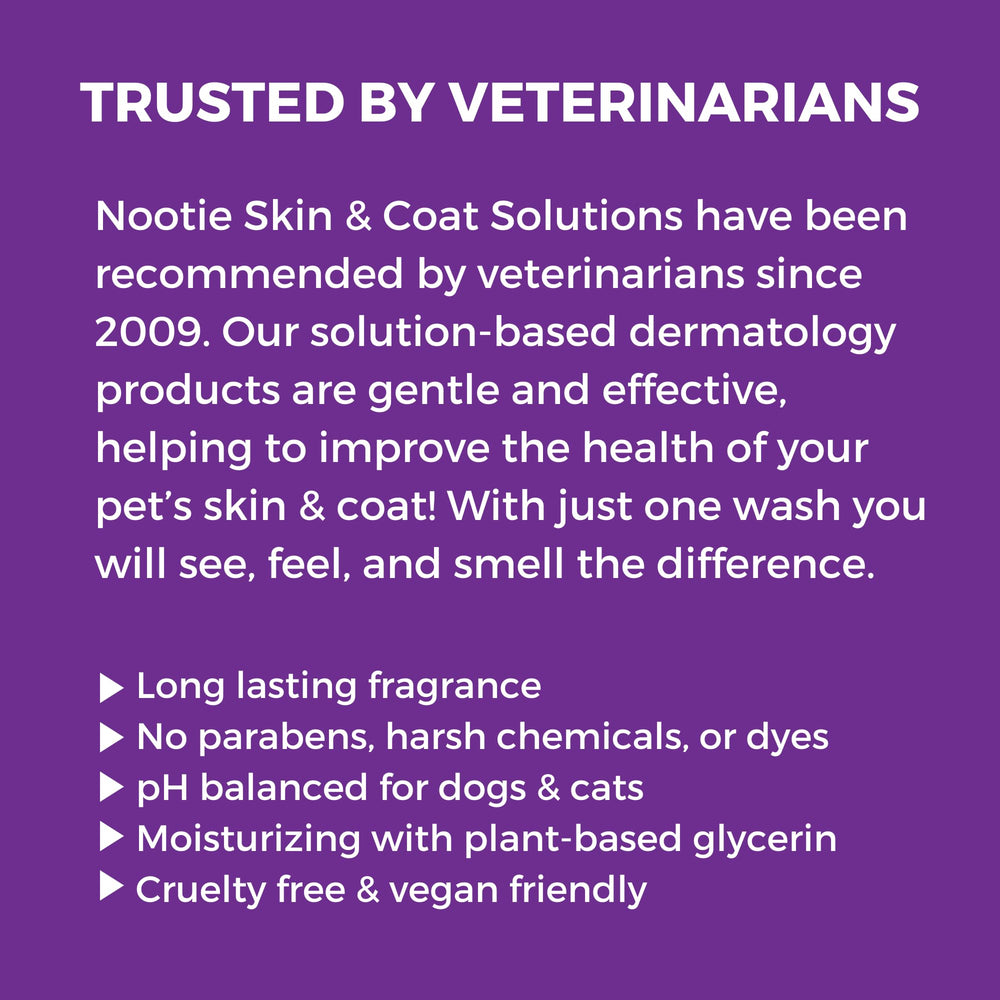 Dog being spritzed during grooming with Nootie Daily Spritz