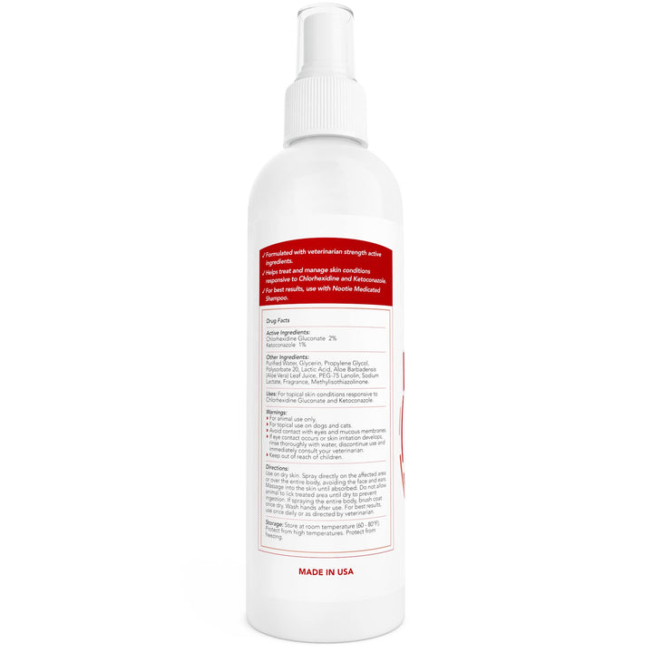 Nootie medicated spray bottle side view showing simple spray-on use.