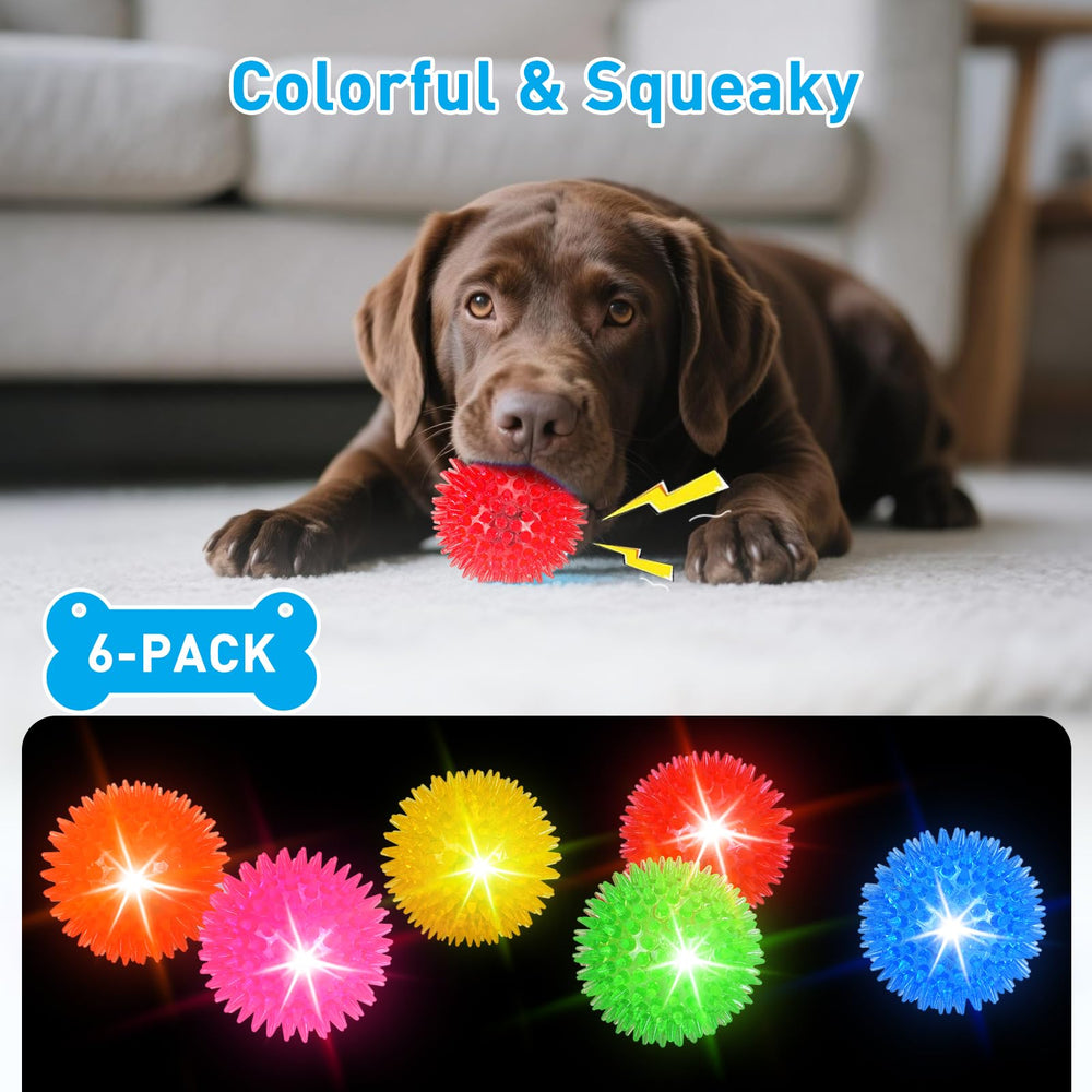 Novkin LED squeaky ball pink glows at dusk for easier recall and play.