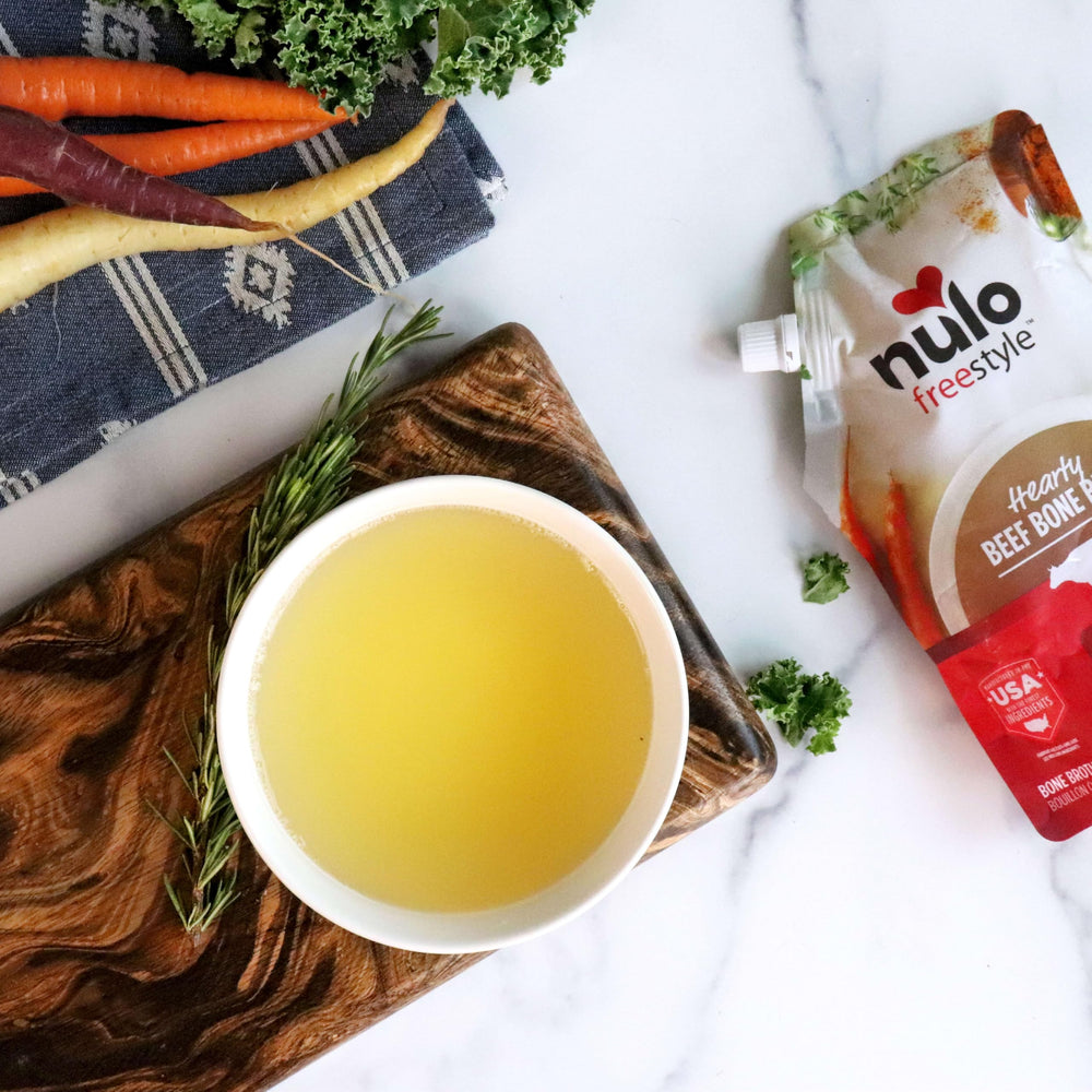 Nulo Freestyle Bone Broth 20 oz triple-pack image shows convenient ready-to-use pouches.