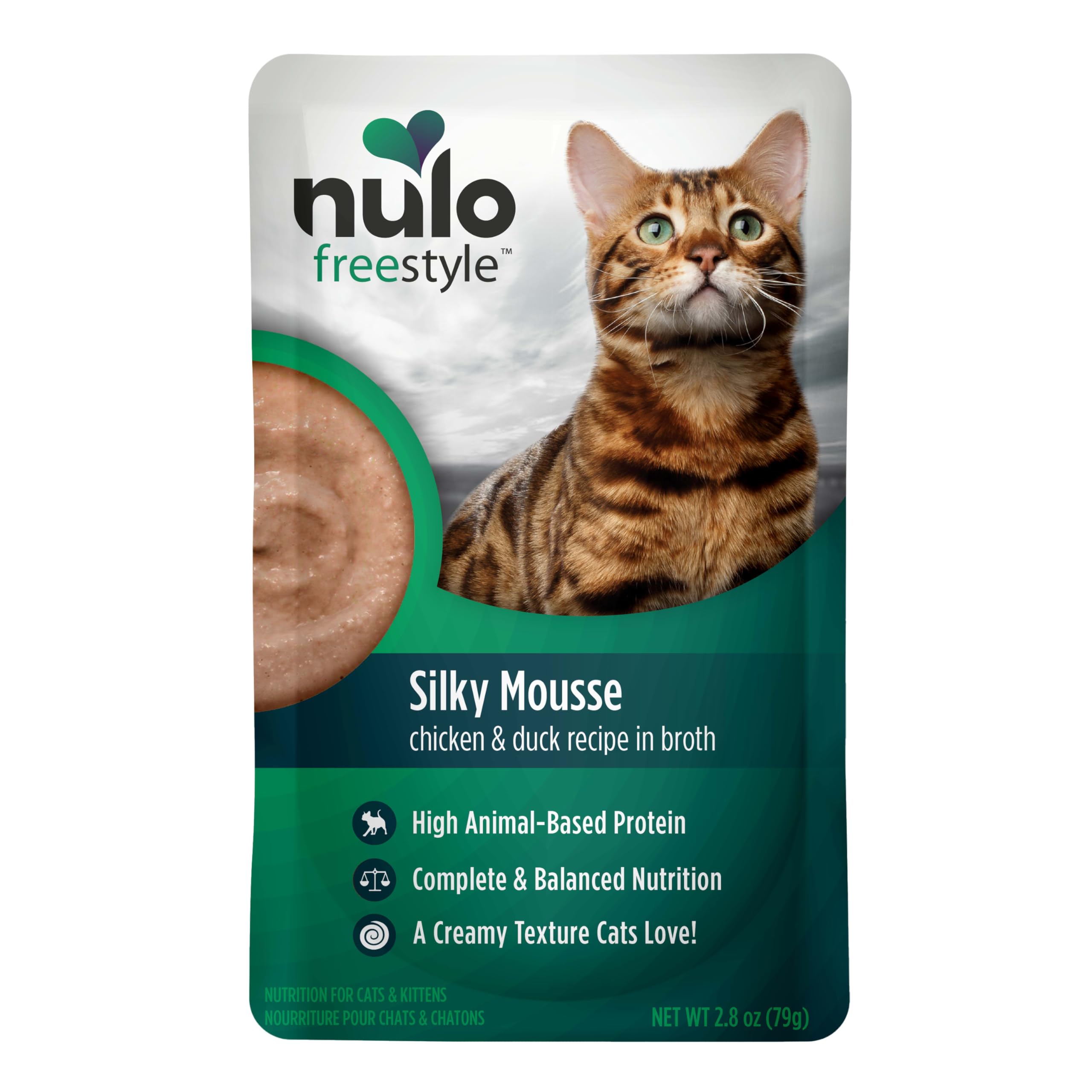 Cat licking Nulo Freestyle mousse to show irresistible texture