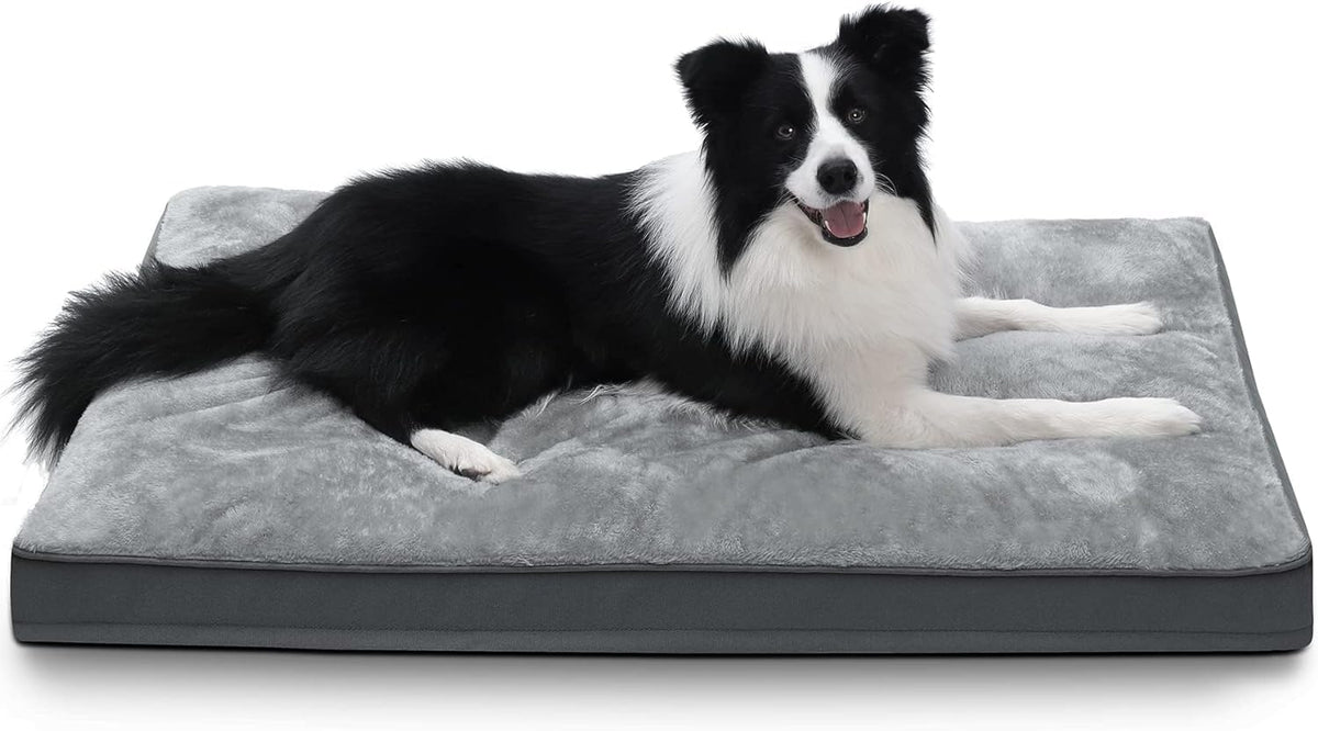 NUPIDA dog crate bed with waterproof plush surface for calm naps.