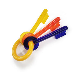 Nylabone Puppy Chew Key Ring Toy bacon flavor close-up; soothing teething for puppies