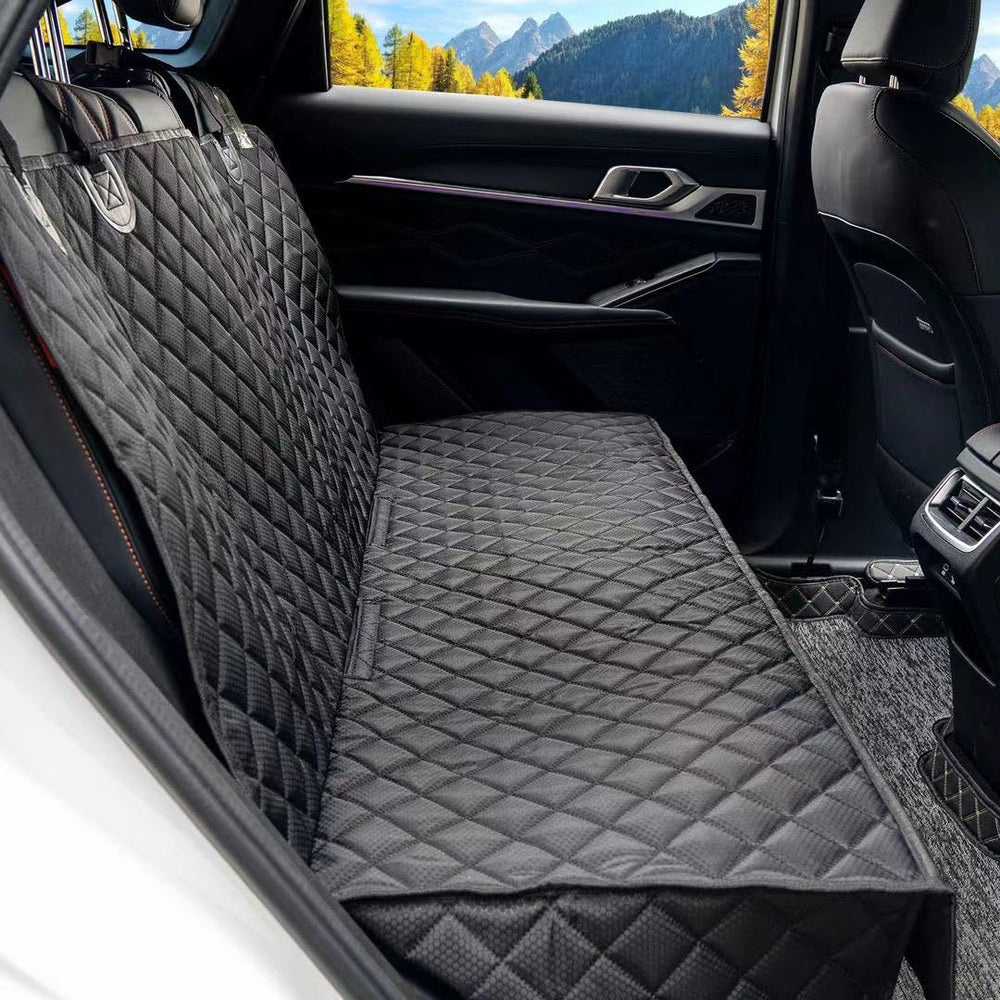 NYLSYT dog seat cover on back seat showing waterproof material for mess-free trips.