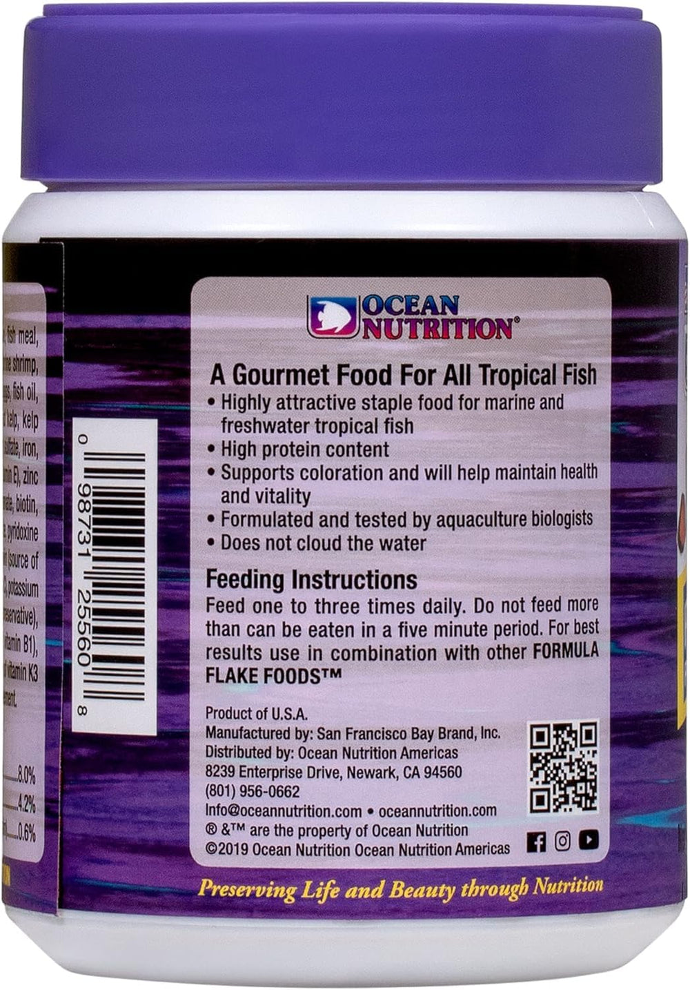 Reef tank feeding scene with Prime Reef Flakes promoting coloration and vitality