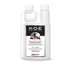 Odorcide K.O.E bottle pour showing quick dilution for odor control.