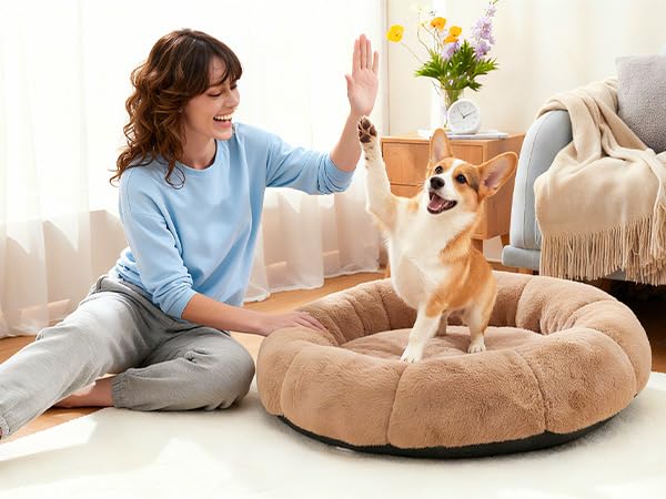 OhGeni Calming Donut Bed suitable for dogs and cats seeking a cushy retreat.