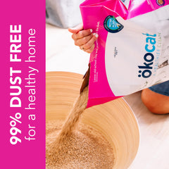 ökocat 99% dust-free wood litter being poured into a box.