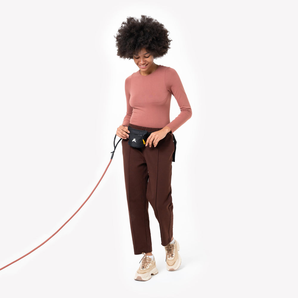 Leash attachment option for OllyDog Goodie Bag during walks.