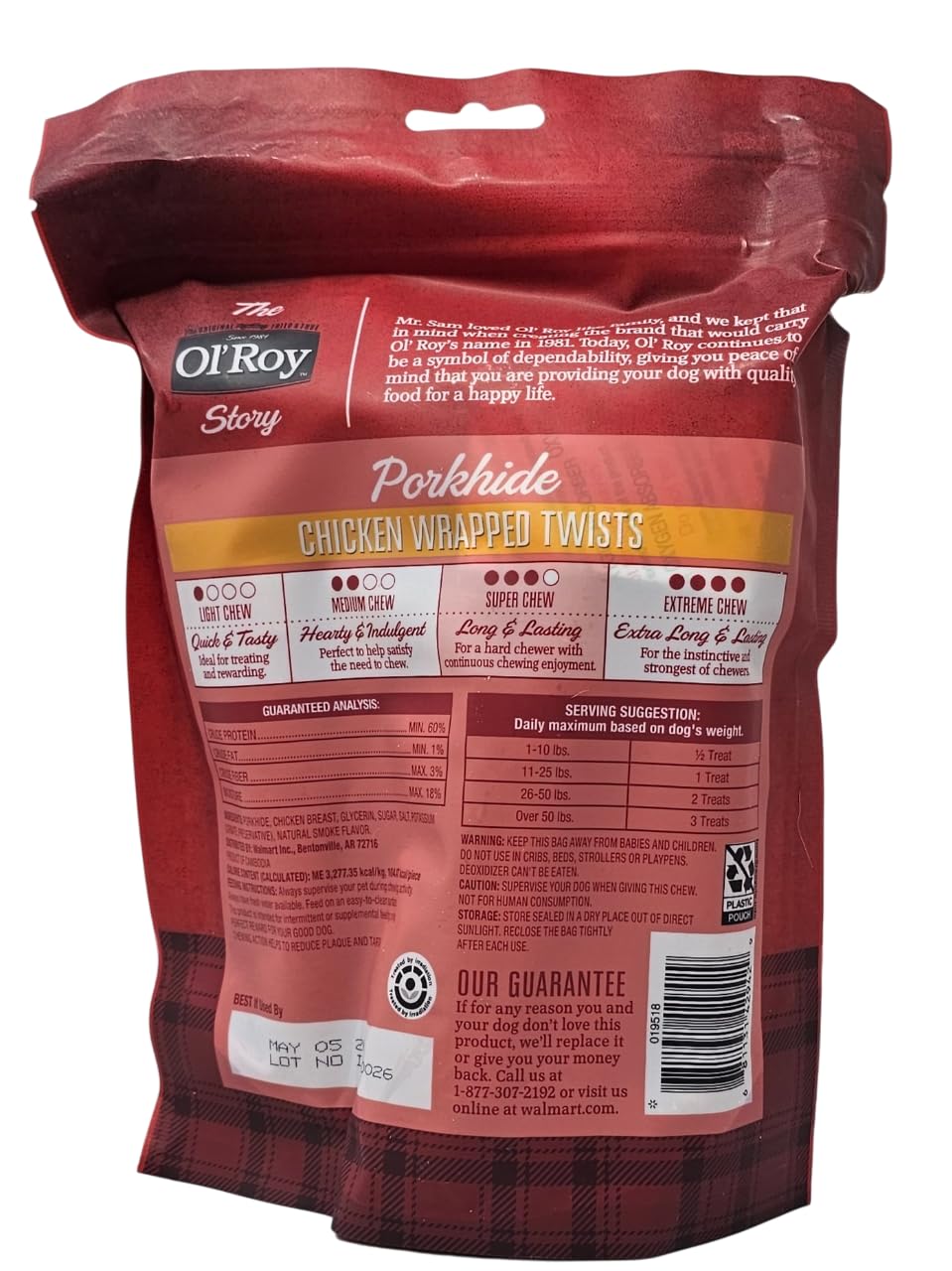 Dog enjoying Ol' Roy porkhide chicken wrapped twists chew
