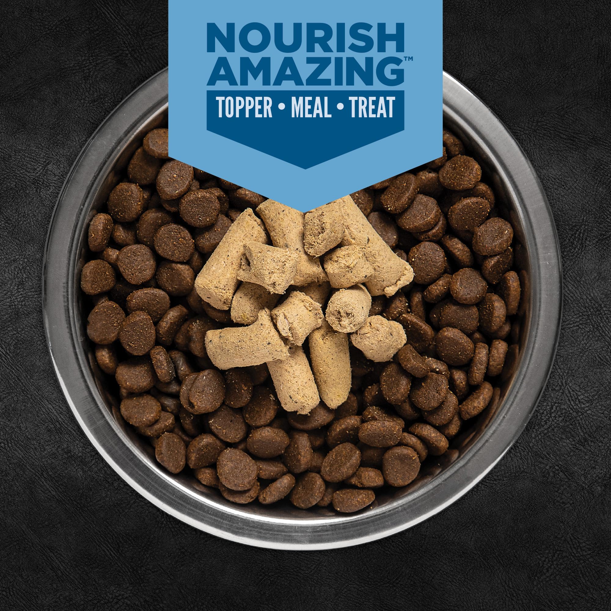 ORIJEN Epic Bites topper on kibble to boost taste and nutrition.