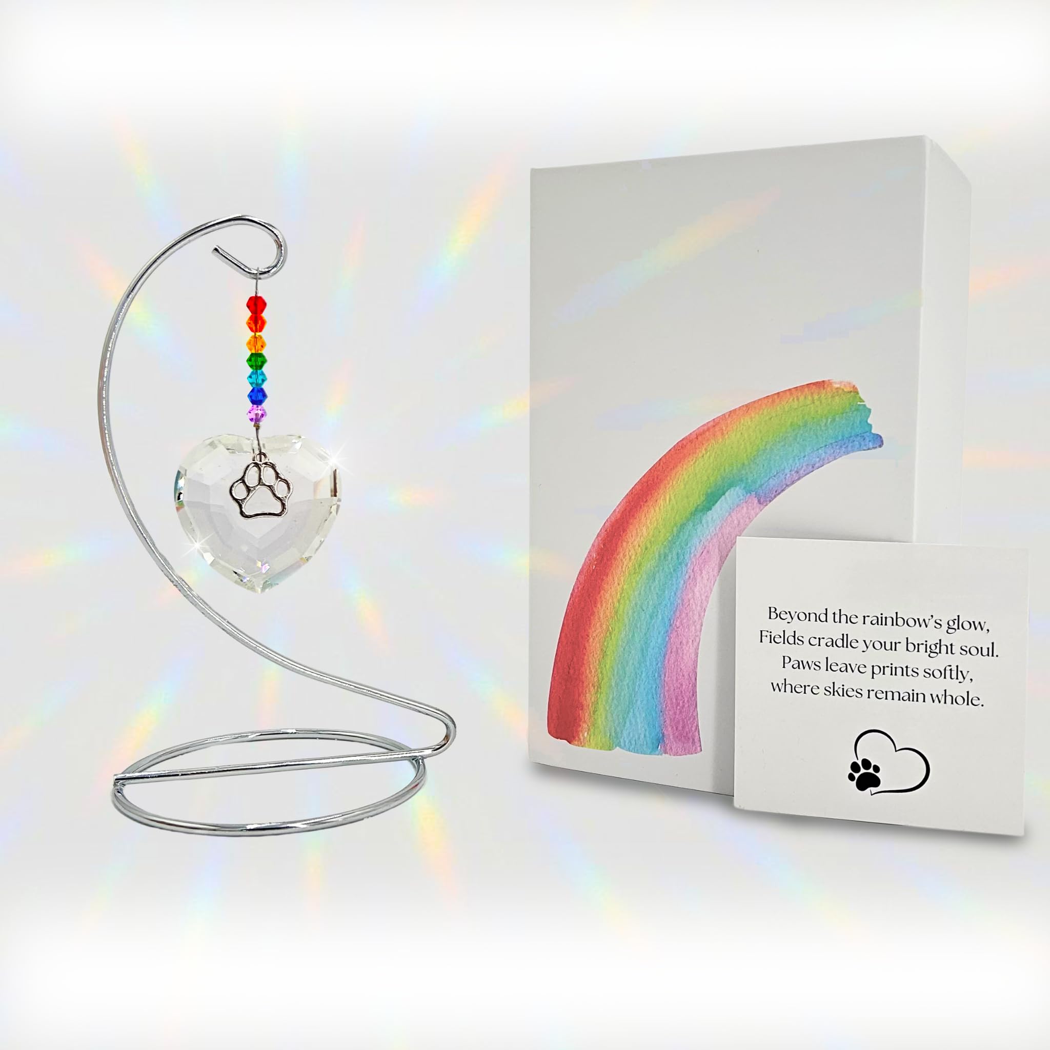 OtterPets Rainbow Bridge paw suncatcher reflecting light to honor a beloved dog