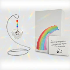 OtterPets Rainbow Bridge paw suncatcher reflecting light to honor a beloved dog