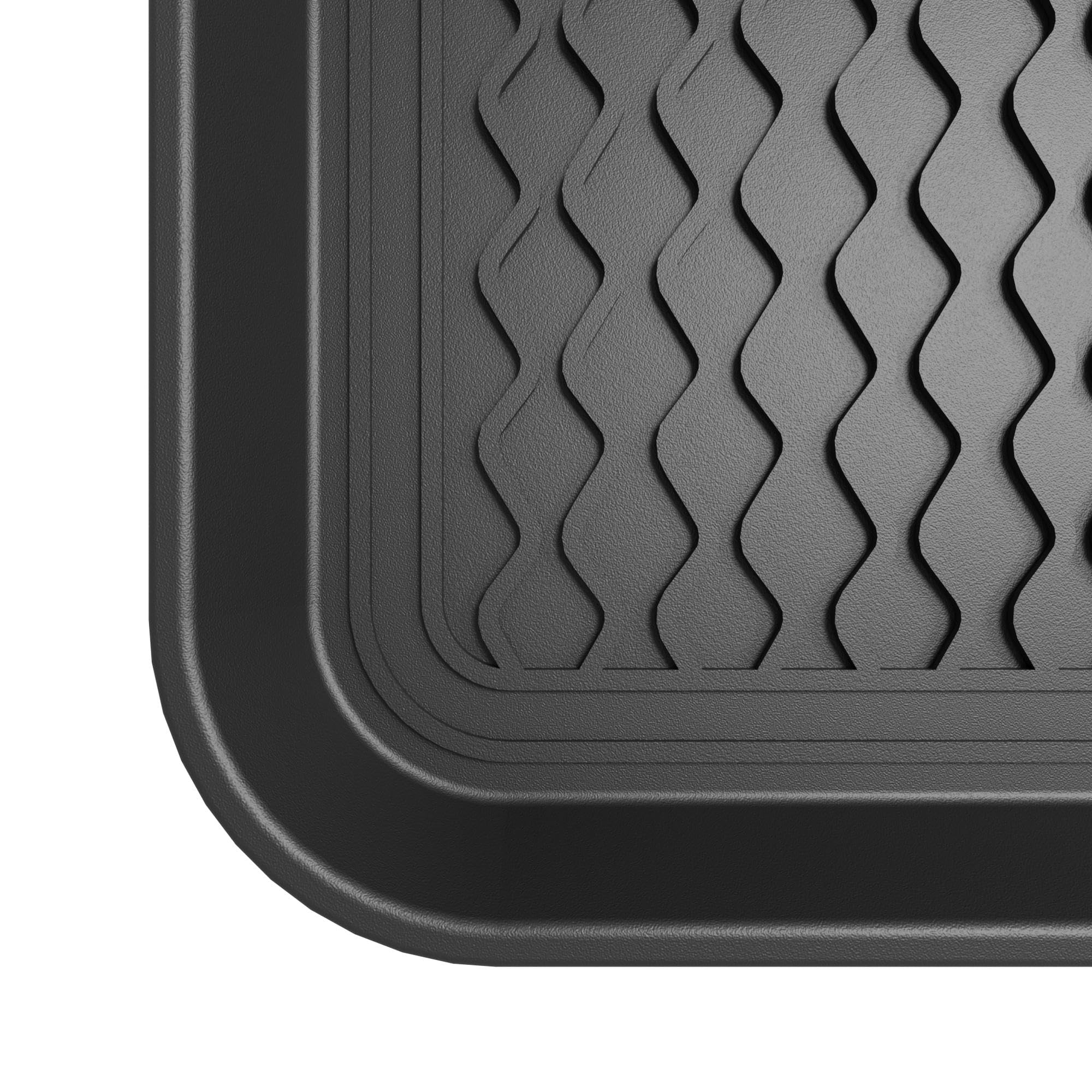 Ottomanson wavy-pattern tray adds style while keeping entryways clean.