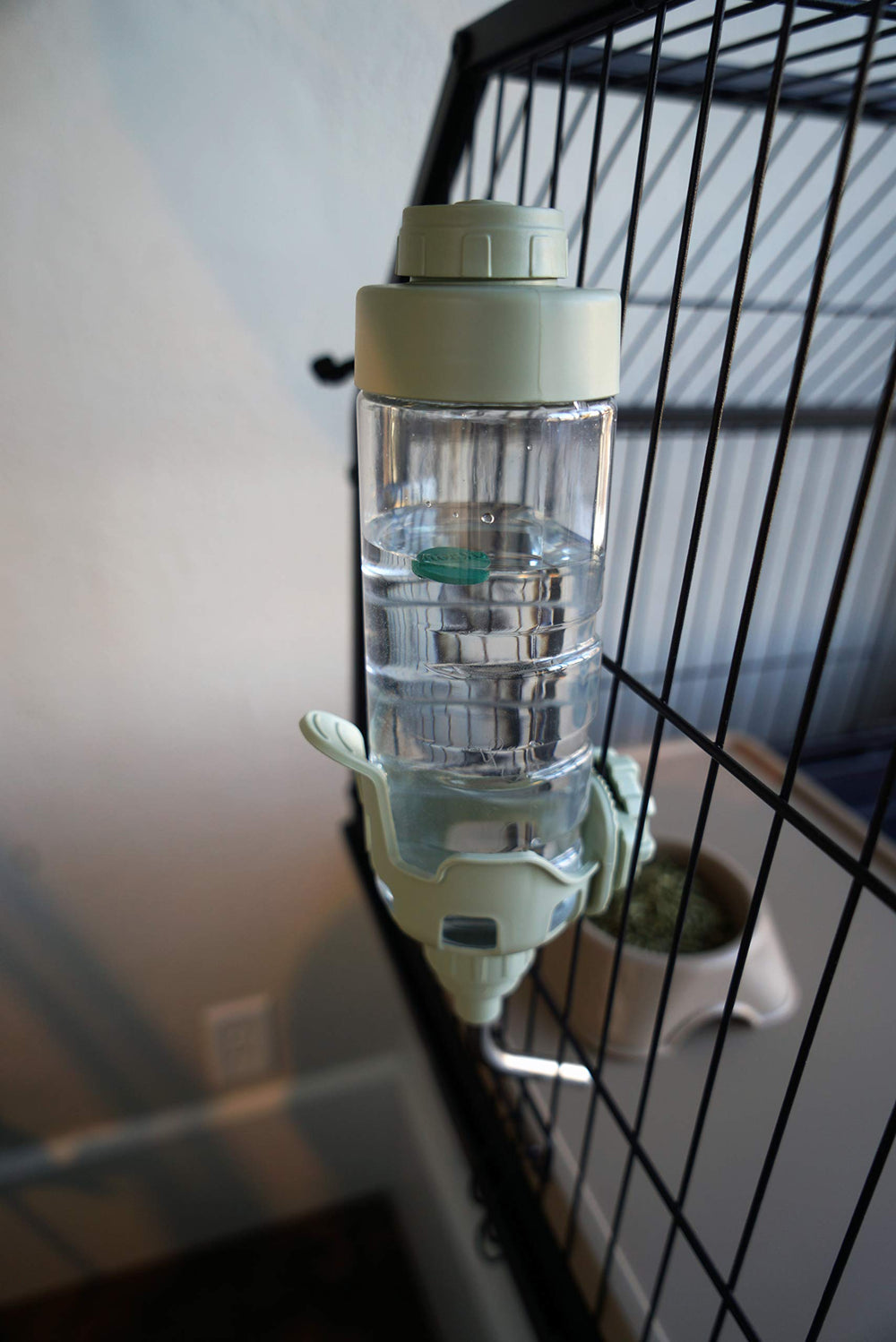 Oxbow bottle used with guinea pig cage for mess-free hydration