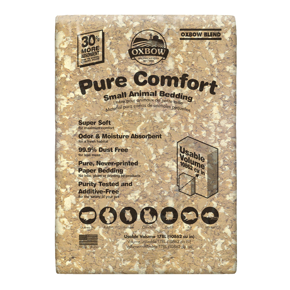 Oxbow Pure Comfort White Bedding spread in a cage for soft, low-dust pet bedding.