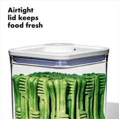 One-handed access to the OXO Good Grips Pet POP lid for quick use.