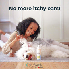 Oxyfresh Advanced Pet Ear Cleaner droplets illustrate fast-acting cleansing on contact