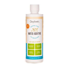 Oxyfresh dental water additive poured into a pet water bowl; easy daily care for fresher breath.