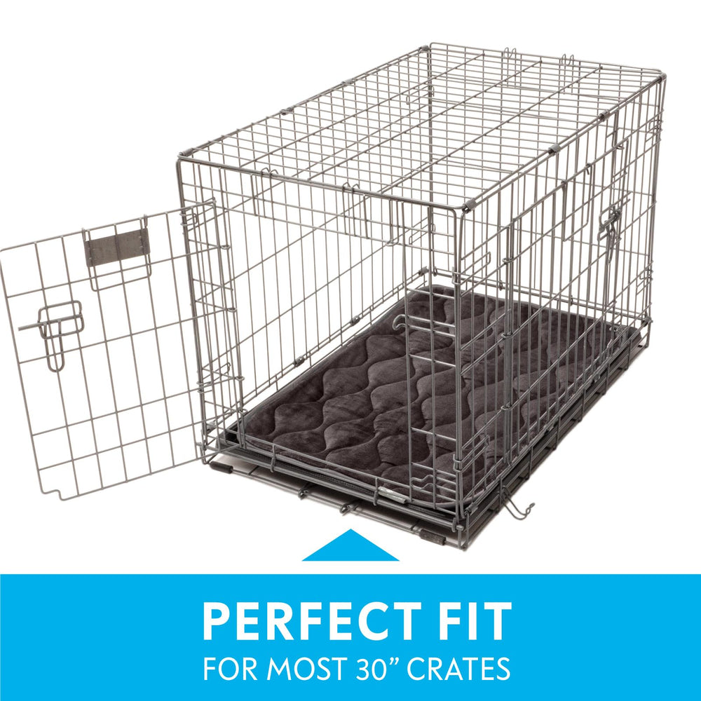 Paw Inspired multi-layer crate mat with absorbent core to reduce mess and odors.