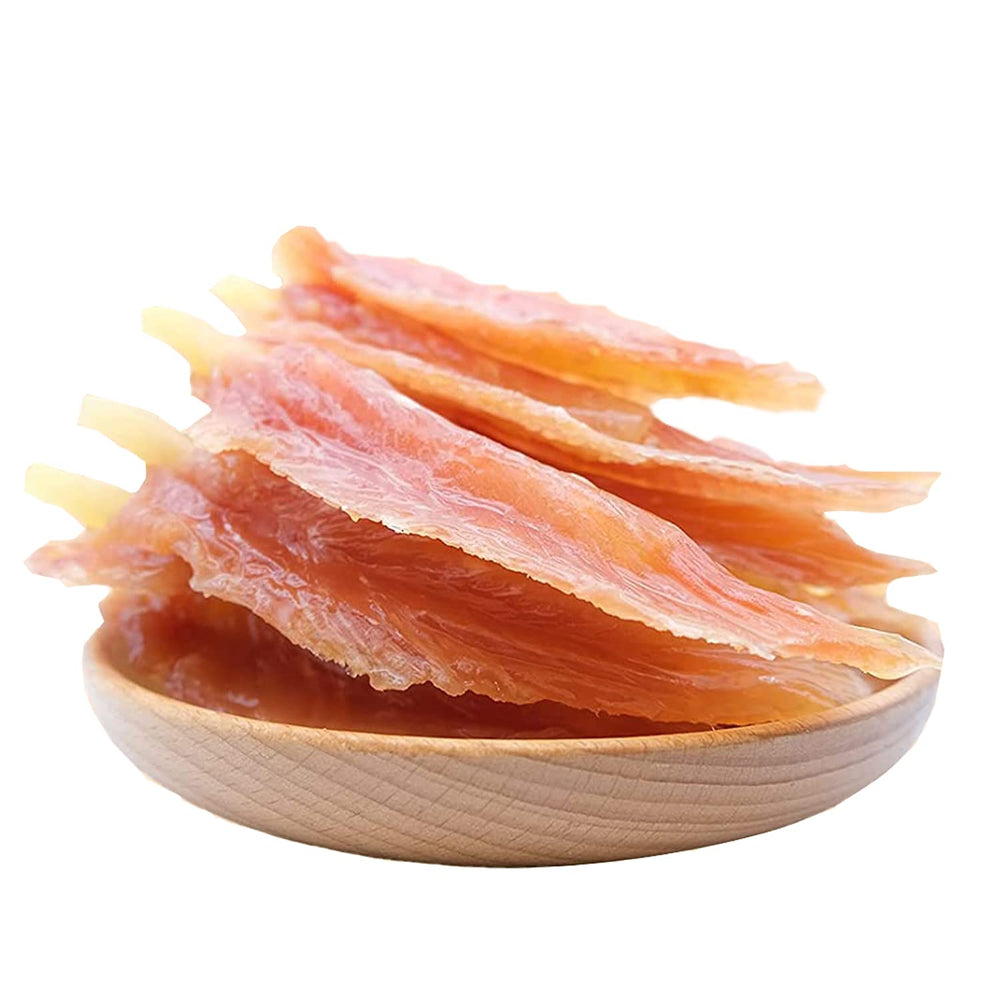 Close-up of Pawmate cod-wrapped chicken sticks showing chewy texture.