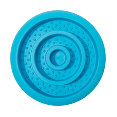 Pawnana slow feeder lick mat with loading action for controlled feeding.