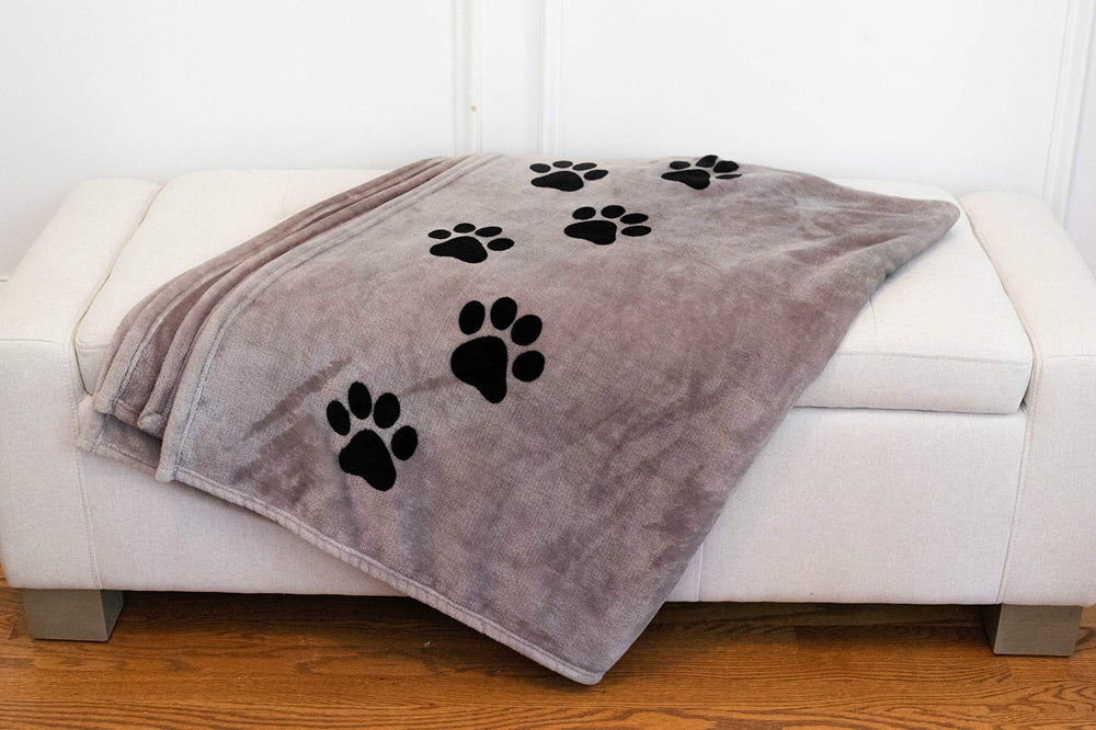 Pawprints Left by You memorial blanket heart detail highlights red accent.