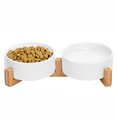Pawsome ceramic elevated bowls in white for cats and small dogs, offering a comfortable feeding setup.