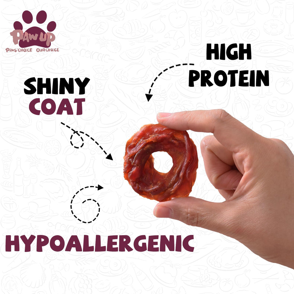 PAWUP Duck Jerky Rings texture closeup emphasizes easy-to-chew rings for dogs.
