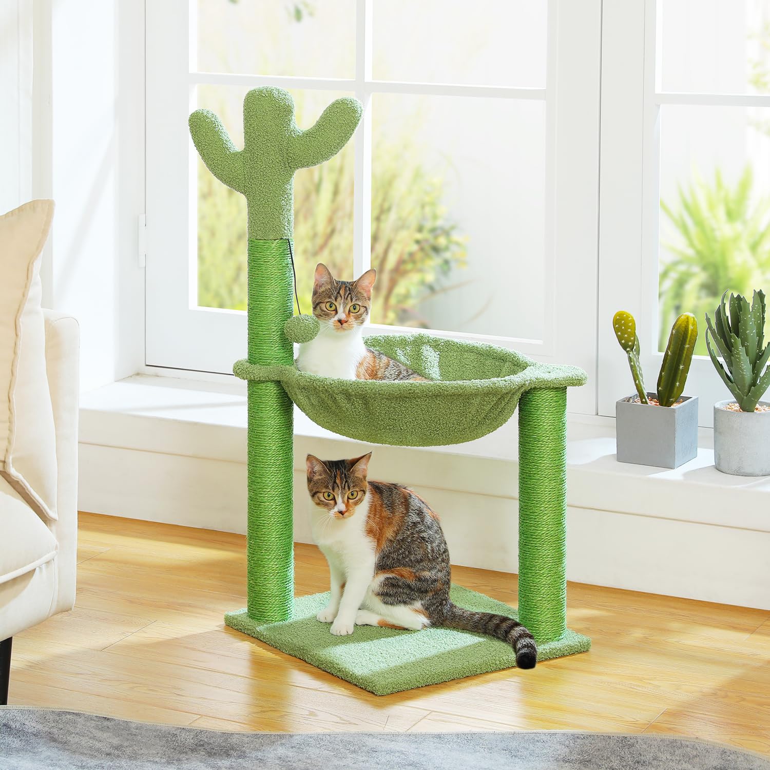 PAWZ Road cat tree with dangling ball for interactive play.