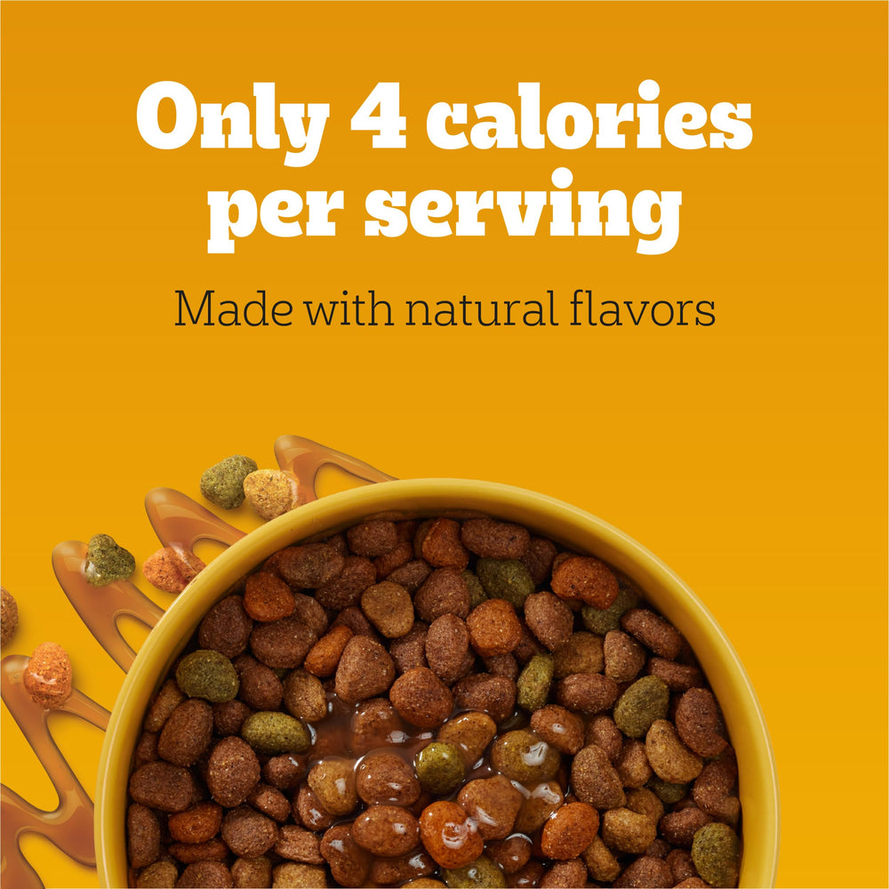 Bowl of kibble topped with Pedigree Drizzlers natural lamb flavor