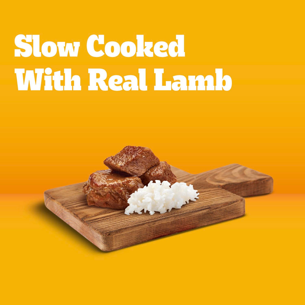 Pedigree Puppy Chopped Ground Dinner lamb and rice served in a bowl for balanced nutrition.