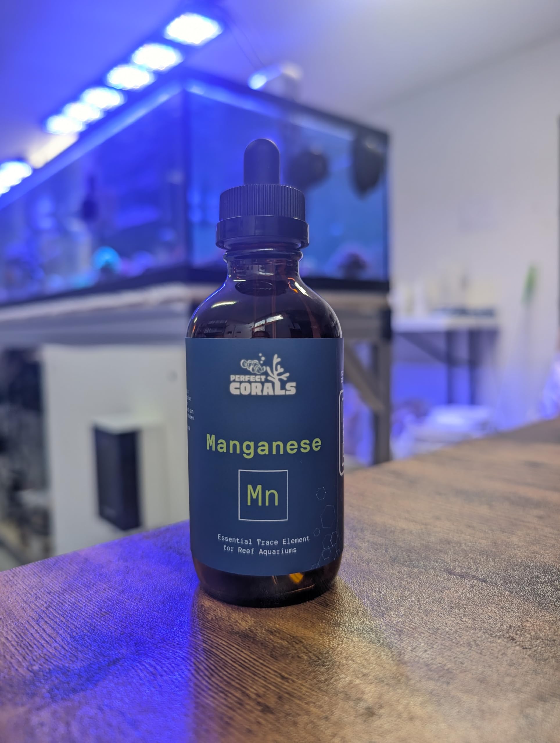 Perfect Corals Manganese dropper-dosing demonstrates precise application for reef tank dosing.