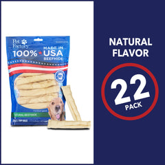Pet Factory dog chewing beefhide chip roll during playtime supports healthy chewing.